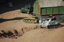 Chandler drives the PZ III into a building.