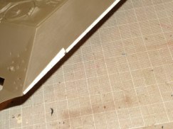 Then using .020 styrene I fabricated the attachment bars along the bottom edges of the upper hull. Craig “modified” the design to a bit based on some reference material he found.