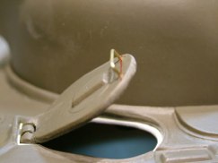 Once the new hatch was fitted I drilled and pinned the hinge with small brass wire, added an internal lip made from styrene for the hatch to close against, and back filled around the hinge to give it a little resistance. Now the hatch can be posed open at any angle, but still also closes down tight against in internal ring or lip.
