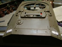 Then using .020 styrene sheet I made a new base plate "cover". I added a small washer and hex head attachment bolt both made from Styrene