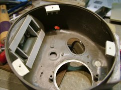 I then fabricated three .060 styrene attachment plates for the inside lip of the turret body, and reinforced them with styrene strip. I drilled corresponding holes through the turret ring and newly made mounting blocks. Then I counter sunk the holes in the bottom of the turret ring, and secured it with flat head screws so they would not interfere with the turret traverse.