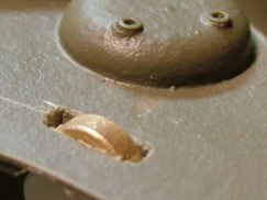 The turret will now sit on top of the three collets that act as a bearing surface. Because they are small they offer little friction or resistance, plus they spin freely, so the wheel collets act as bearings and literally allow the turret to glide over the hull plate