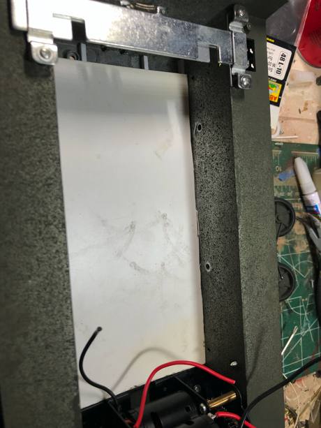 False floor installed to house accessories and clean up interior. Just stock plastic cut to shape.