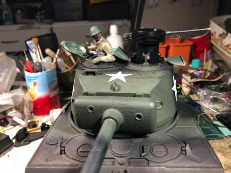 I used a Tamiya battle system and a Tiger base plate with some styrene to mount it in the loaders hatch. I like to put commanders in their Hatch.