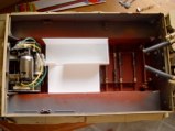 Plastic box inside hull to hold batteries and DMD / MF control boxes.