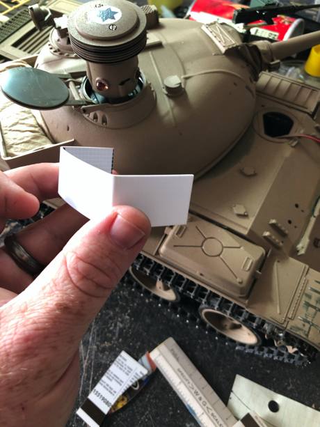 Adding side stowage bin. Started with plastic card and bent it and sanded to shape.